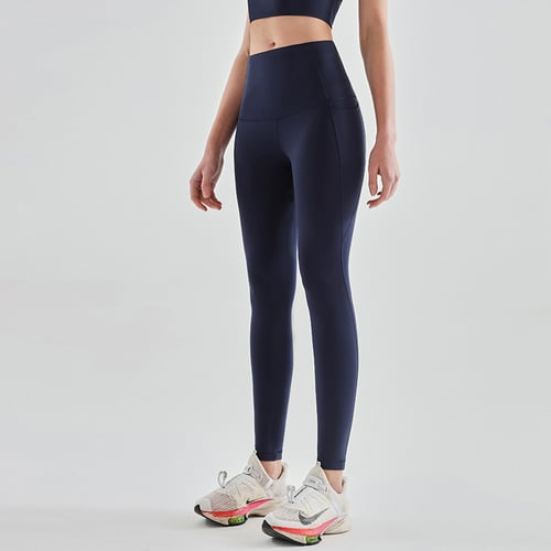 Leggings de treino com controle de barriga de cintura alta e bolsos laterais